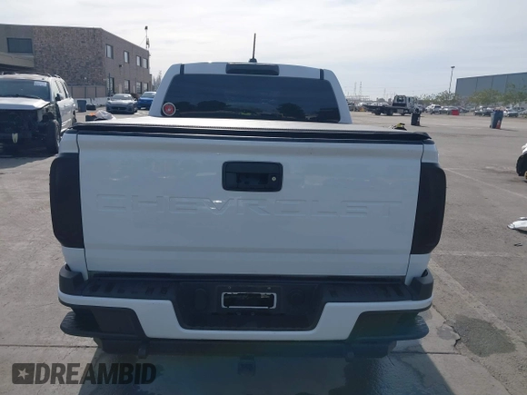 2021 Chevrolet Colorado 2WD Work Truck z VIN 1GCGSBENXM1118310, wystawiony jako IAAI lot #41668804 z przebiegiem 65 295 mil mil oraz . Historia ofert i sprzedaży dostępna na DreamBid. Obrazek 17.