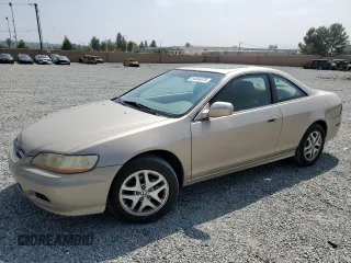 2001 Honda Accord EX z VIN 1HGCG22501A001661, wystawiony jako Copart lot #54354575 z przebiegiem 237 867 mil mil oraz Szkoda całkowita • Salvage title. Historia ofert i sprzedaży dostępna na DreamBid. Obrazek 1.