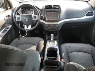 2015 Dodge Journey SXT with VIN 3C4PDCCG5FT559021, listed as a Copart auction lot 60101335 with 323,930 mi miles and Salvage title. Bid and sale history available at DreamBid. Image 8.