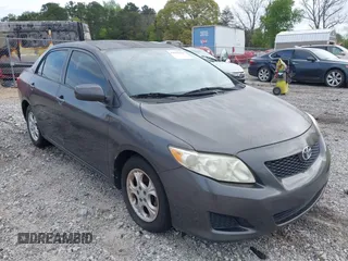 2009 Toyota Corolla with VIN JTDBL40E399032176, listed as a IAAI auction lot 42035968 with 213,062 mi miles. Bid and sale history available at carsss.com. Image 6.