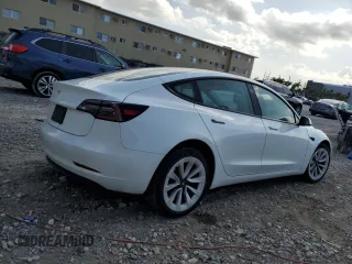 2023 Tesla Model 3 z VIN 5YJ3E1EAXPF422956, wystawiony jako Copart lot #52500285 z przebiegiem 24 082 mil mil oraz Nie do naprawy • Non repairable. Historia ofert i sprzedaży dostępna na DreamBid. Obrazek 3.