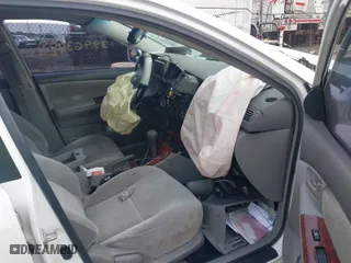 2004 Toyota Corolla CE with VIN 1NXBR32E64Z196304, listed as a IAAI auction lot 41068676 with 121,637 mi miles. Bid and sale history available at carsss.com. Image 5.