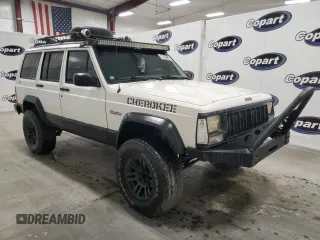 1996 Jeep Cherokee Sport with VIN 1J4FJ68S5TL235927, listed as a Copart auction lot 68942174 with 238,619 mi miles and Clean Title. Bid and sale history available at carsss.com. Image 4.