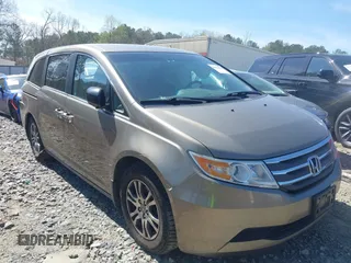 2012 Honda Odyssey EX with VIN 5FNRL5H44CB022592, listed as a IAAI auction lot 41891818 with 123,697 mi miles and . Bid and sale history available at carsss.com. Image 1.