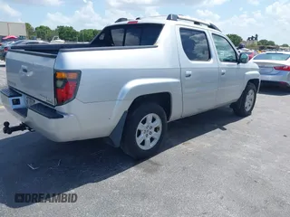 2007 Honda Ridgeline RTL z VIN 2HJYK16557H506463, wystawiony jako IAAI lot #42511456 z przebiegiem 133 701 mil mil oraz . Historia ofert i sprzedaży dostępna na DreamBid. Obrazek 4.