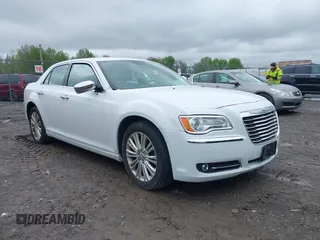 2014 Chrysler 300 C with VIN 2C3CCAKG5EH200996, listed as a IAAI auction lot 42201747 with 156,121 mi miles and . Bid and sale history available at carsss.com. Image 1.