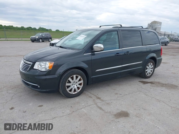 2012 Chrysler Town & Country Touring L with VIN 2C4RC1CG1CR163442, listed as a IAAI auction lot 42207924 with 197,111 mi miles and . Bid and sale history available at DreamBid. Image 2.