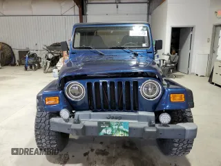 2002 Jeep Wrangler Sport with VIN 1J4FA49S82P703420, listed as a Copart auction lot 53322175 with 87,642 mi miles and Salvage Title. Bid and sale history available at carsss.com. Image 5.