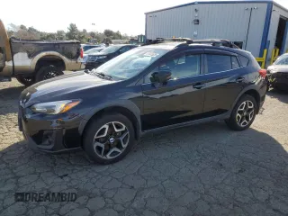 2018 Subaru Crosstrek Limited with VIN JF2GTAMC1JH306824, listed as a Copart auction lot 87843525 with 72,456 mi miles and Salvage title. Bid and sale history available at DreamBid. Image 1.