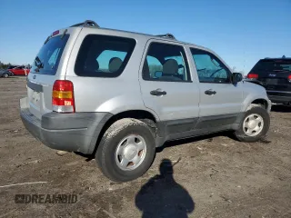 2004 Ford Escape XLS with VIN 1FMYU92124KA89643, listed as a Copart auction lot 84162924 with 177,930 mi miles and Clean Title. Bid and sale history available at DreamBid. Image 3.