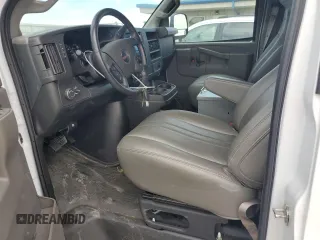 2023 GMC Savana Cargo Van with VIN 1GTW7AFP7P1111956, listed as a Copart auction lot 69986504 with 11,645 mi miles and Salvage Title. Bid and sale history available at carsss.com. Image 7.