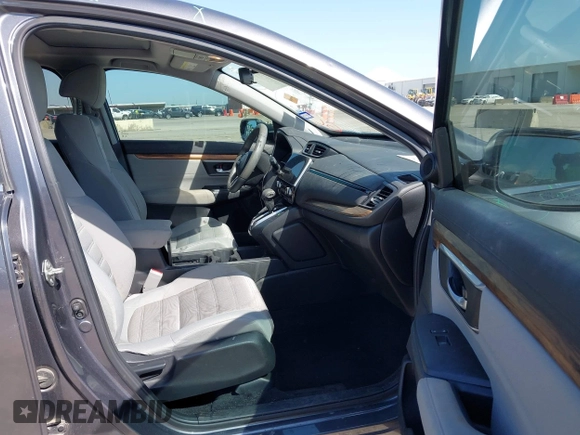 2019 Honda CR-V EX with VIN 5J6RW1H58KA042502, listed as a IAAI auction lot 42001700 with 117,396 mi miles and . Bid and sale history available at DreamBid. Image 5.