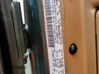 1999 Jeep Wrangler Sport with VIN 1J4FY19S0XP402688, listed as a Copart auction lot 58968125 with 211,910 mi miles and Salvage title. Bid and sale history available at DreamBid. Image 13.