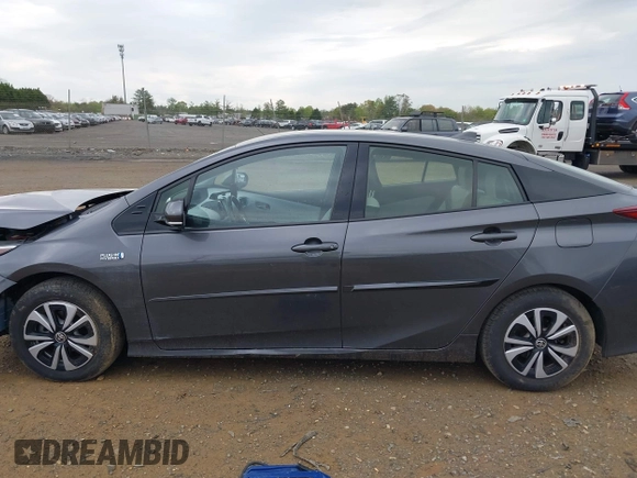 2018 Toyota Prius Plus with VIN JTDKARFP6J3078362, listed as a IAAI auction lot 42021835 with 61,170 mi miles and . Bid and sale history available at DreamBid. Image 14.