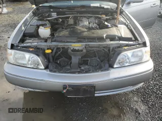 1999 Infiniti Q45 z VIN JNKBY31A3XM602869, wystawiony jako Copart lot #78799354 z przebiegiem 189 083 mil mil oraz Szkoda całkowita • Salvage title. Historia ofert i sprzedaży dostępna na DreamBid. Obrazek 11.