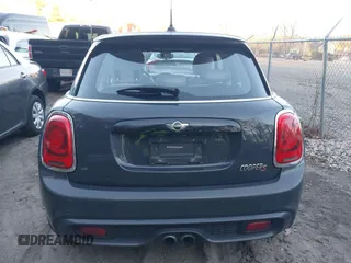 2016 MINI Cooper Hardtop 4 Door S with VIN WMWXU3C56G2B63682, listed as a IAAI auction lot 41244676 with 110,902 mi miles. Bid and sale history available at carsss.com. Image 17.