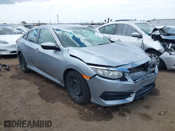 2018 Honda Civic LX with VIN 2HGFC2F50JH500559, listed as a IAAI auction lot 42040271 with 82,026 mi miles and . Bid and sale history available at DreamBid. Image 1.