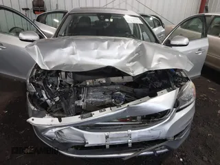 2016 Volvo S60 T5 Drive-E Premier z VIN YV126MFKXG1395519, wystawiony jako IAAI lot #41488969 z przebiegiem 109 130 mil mil oraz . Historia ofert i sprzedaży dostępna na DreamBid. Obrazek 6.