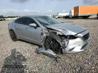 2016 Mazda 6 i Grand Touring с VIN JM1GJ1W53G1434499, выставлен на аукционе Copart как лот 54739745 с пробегом Не указан миль и Списание • Salvage title. История ставок и продаж доступна на DreamBid. Изображение 4.