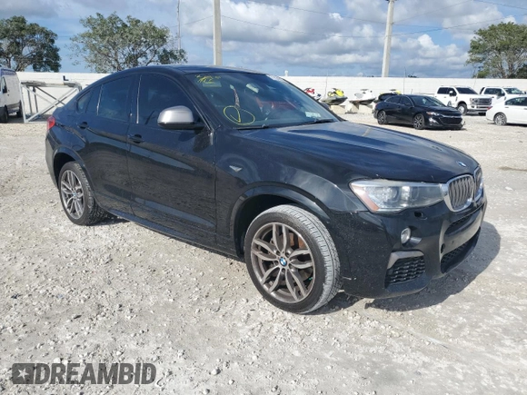 2017 BMW X4 M40i with VIN 5UXXW7C55H0U24877, listed as a Copart auction lot 71824502 with 0 mi miles. Bid and sale history available at carsss.com. Image 4.