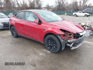 2023 Tesla Model Y Long Range with VIN 7SAYGDEE1PA169031, listed as a IAAI auction lot 41660766 with 35,253 mi miles and . Bid and sale history available at DreamBid. Image 1.