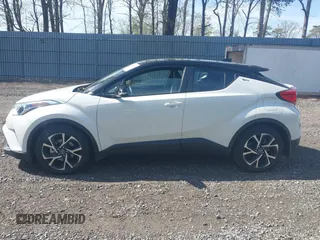 2019 Toyota C-HR XLE with VIN NMTKHMBX5KR097682, listed as a IAAI auction lot 42145372 with 11,003 mi miles and . Bid and sale history available at DreamBid. Image 14.