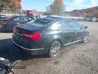 2014 Kia Cadenza Premium with VIN KNALN4D77E5163619, listed as a IAAI auction lot 40759426 with 154,368 mi miles. Bid and sale history available at carsss.com. Image 4.