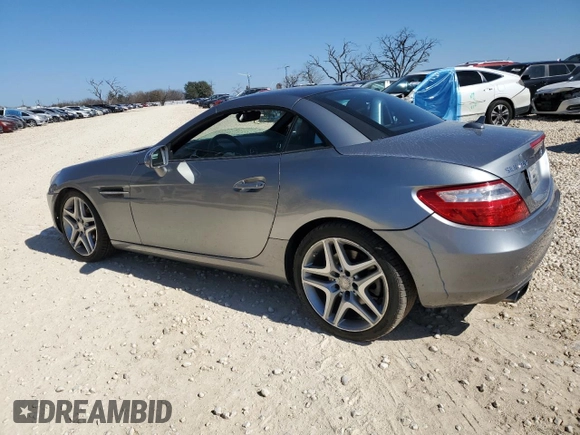 2013 Mercedes-Benz SLK 250 с VIN WDDPK4HAXDF070563, выставлен на аукционе Copart как лот 45769115 с пробегом 66 371 миль миль и Списание • Salvage title. История ставок и продаж доступна на DreamBid. Изображение 2.