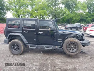 2012 Jeep Wrangler Unlimited Sport with VIN 1C4BJWDG8CL120308, listed as a IAAI auction lot 42365817 with 190,619 mi miles and . Bid and sale history available at DreamBid. Image 14.