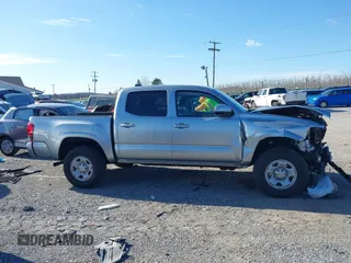 2023 Toyota Tacoma 4WD SR with VIN 3TMCZ5AN2PM638929, listed as a IAAI auction lot 41860423 with 12,246 mi miles. Bid and sale history available at carsss.com. Image 13.