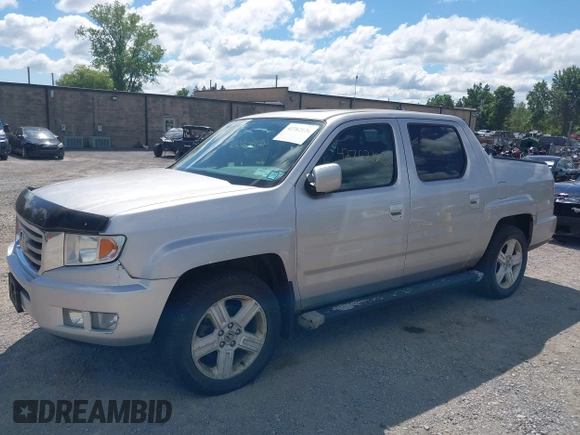 2013 Honda Ridgeline RTL with VIN 5FPYK1F51DB007236, listed as a IAAI auction lot 42762126 with 201,758 mi miles and . Bid and sale history available at DreamBid. Image 18.