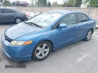 2006 Honda Civic LX with VIN 1HGFA16506L058909, listed as a IAAI auction lot 42077582 with 266,658 mi miles and . Bid and sale history available at DreamBid. Image 2.
