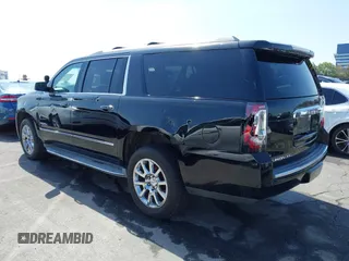 2015 GMC Yukon XL Denali with VIN 1GKS1JKJ1FR134428, listed as a IAAI auction lot 42149588 with 116,207 mi miles. Bid and sale history available at carsss.com. Image 3.