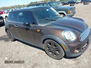 2012 MINI Hardtop with VIN WMWSU3C56CT257654, listed as a IAAI auction lot 42099156 with 84,384 mi miles and . Bid and sale history available at DreamBid. Image 1.