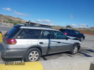 1999 Subaru Legacy Outback z VIN 4S3BG6850X6621723, wystawiony jako IAAI lot #41932992 z przebiegiem 283 200 mil mil oraz . Historia ofert i sprzedaży dostępna na DreamBid. Obrazek 13.