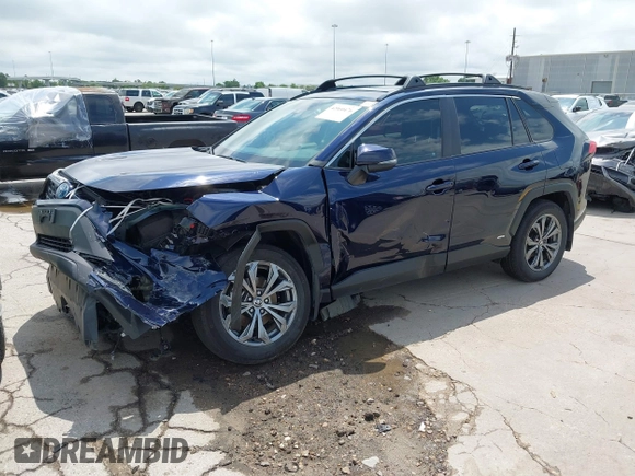 2024 Toyota RAV4 Hybrid XLE Premium with VIN 4T3B6RFV6RU146619, listed as a IAAI auction lot 42060476 with 22,594 mi miles and . Bid and sale history available at DreamBid. Image 2.
