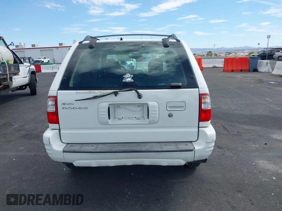 2001 Isuzu Rodeo S with VIN 4S2CK58W614329085, listed as a IAAI auction lot 42303013 with 171,933 mi miles and . Bid and sale history available at DreamBid. Image 14.