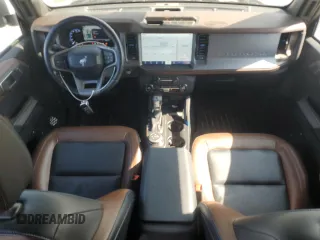 2023 Ford Bronco with VIN 1FMEE5BP0PLC06549, listed as a Copart auction lot 58703305 with 28,051 mi miles and Salvage title. Bid and sale history available at DreamBid. Image 8.