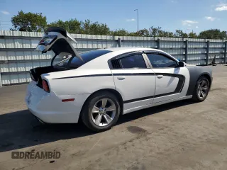 2013 Dodge Charger SE with VIN 2C3CDXBG8DH677551, listed as a Copart auction lot 53260735 with 124,248 mi miles and Salvage Title. Bid and sale history available at DreamBid. Image 3.