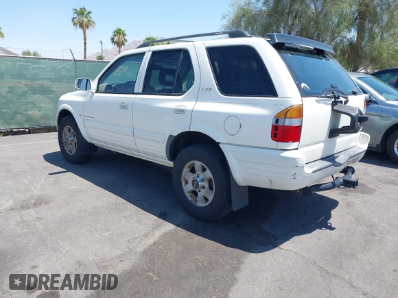 1999 Isuzu Rodeo S with VIN 4S2CK58W7X4325703, listed as a IAAI auction lot 42715480 with 205,420 mi miles and . Bid and sale history available at DreamBid. Image 3.
