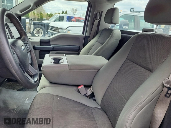 2016 Ford F-150 XL with VIN 1FTMF1C85GKE09195, listed as a IAAI auction lot 42143257 with 297,704 mi miles. Bid and sale history available at carsss.com. Image 1.