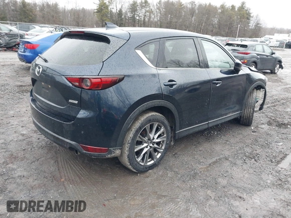 2019 Mazda CX-5 Signature with VIN JM3KFBEY4K0525171, listed as a IAAI auction lot 41706635 with 88,293 mi miles. Bid and sale history available at carsss.com. Image 4.