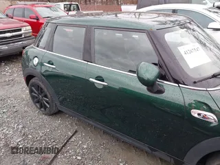 2016 MINI Cooper Hardtop 4 Door S with VIN WMWXU3C58G2D31595, listed as a IAAI auction lot 41267547 with 145,191 mi miles. Bid and sale history available at carsss.com. Image 13.