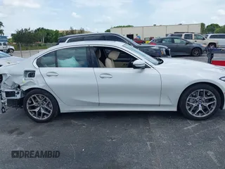 2025 BMW 3 Series 330i with VIN 3MW69CW0XS8F32371, listed as a IAAI auction lot 42630553 with 11,417 mi miles and . Bid and sale history available at DreamBid. Image 14.