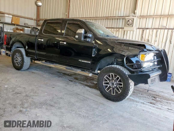2017 Ford F-250 Lariat with VIN 1FT7W2BT2HEB92374, listed as a Copart auction lot 59897975 with 310,479 mi miles and Salvage title. Bid and sale history available at DreamBid. Image 4.