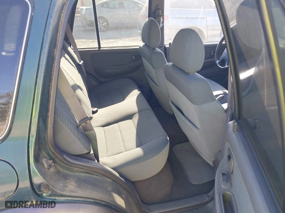 2002 Kia Sportage with VIN KNDJA723425144951, listed as a IAAI auction lot 42049262 with 149,793 mi miles. Bid and sale history available at carsss.com. Image 8.