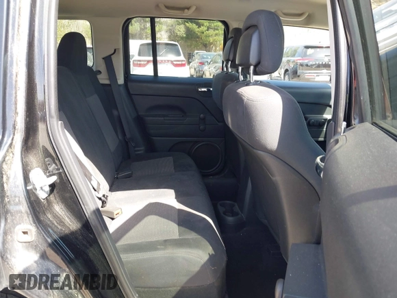 2012 Jeep Patriot Sport with VIN 1C4NJRBB3CD599477, listed as a IAAI auction lot 42147528 with 144,269 mi miles. Bid and sale history available at carsss.com. Image 8.