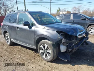 2018 Subaru Forester Premium with VIN JF2SJAEC9JH411903, listed as a IAAI auction lot 41844000 with 91,090 mi miles and . Bid and sale history available at DreamBid. Image 1.