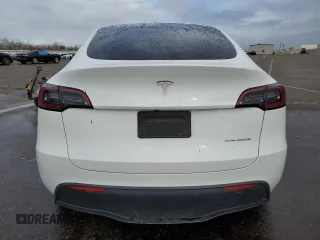 2023 Tesla Model Y Long Range z VIN 7SAYGAEE5PF743079, wystawiony jako Copart lot #45570655 z przebiegiem 46 145 mil mil oraz Szkoda całkowita • Salvage title. Historia ofert i sprzedaży dostępna na DreamBid. Obrazek 6.