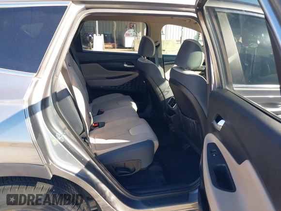 2019 Hyundai Santa Fe SE z VIN 5NMS23AD9KH037539, wystawiony jako IAAI lot #42221894 z przebiegiem 87 755 mil mil oraz . Historia ofert i sprzedaży dostępna na DreamBid. Obrazek 8.